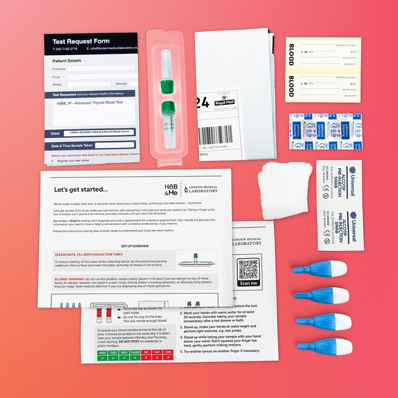 A blood test kit with instructions, collection tools, and packaging materials.