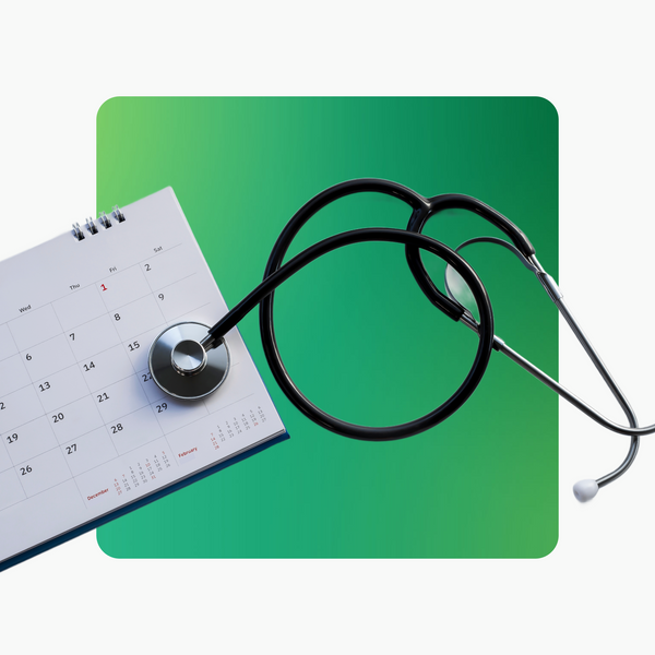 A stethoscope and calendar on green background